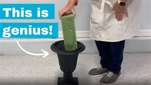 She stuffs floral foam into a pot for this breathtaking porch idea!