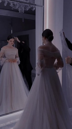 Stunning Bridal Gown Preparation in Elegant Setting