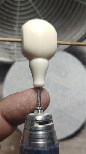 Making a handicraft from clay using simple shaping techniques