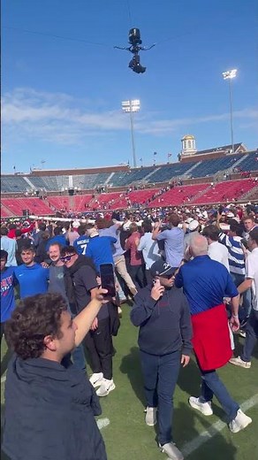SMU fans carry goal post away after win over Miami