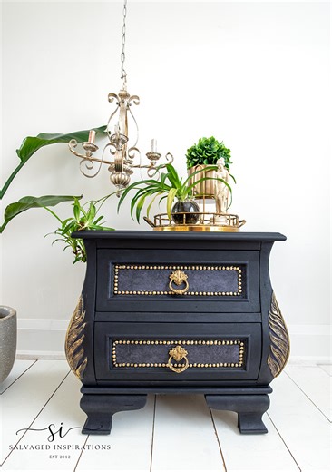 A cute little chest restyled with blended Aubergine & Light Dusty Lilac color, paint-washed to give it a darker hue, and gold wax to highlight the details. #furniture #paintedfurniture #furnituremakeover #paintwash #furnituredesign | Salvaged Inspirations