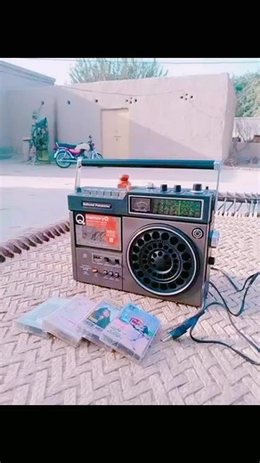 Vintage Boombox Showcase in Rustic Outdoor Setting