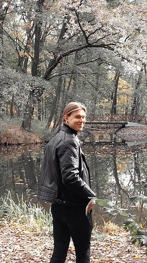 Slavic Metalhead in Gothic Outfit with Long Hair