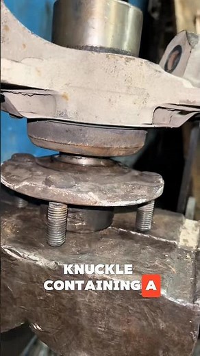 The process of dismantling the wheel knuckle containing the wheel bearings #engineering #mechanic