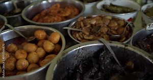 Sega Jamblang or Nasi Jamblang is a typical food from Cirebon, West Java. The distinctive feature of this food is the use of teak leaves as rice wrappers with many choices of side dishes