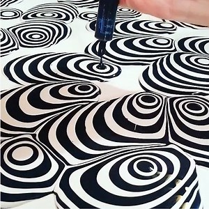 This artist uses a syringe as his paintbrush. | Culture Insider