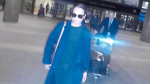 Fashionable flyer! Alicia Vikander is stylish leaving LAX