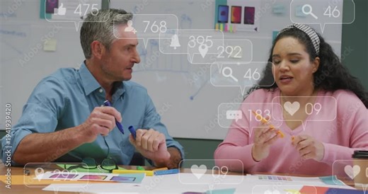 UX team sitting at table sorting prints and palettes swapping pens spawning rising feedback counts