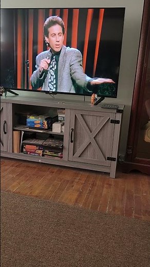 Seinfeld intro on stage. The finger