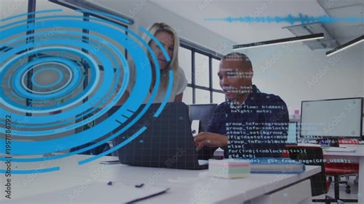 Man gesturing then typing while woman leaning over laptop, reviewing tech code with blue overlay