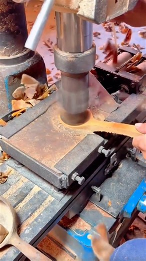 Carving The Concave Bowl Of Wooden Spoons Using A Specialized Industrial Drill Press Machine