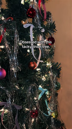Why am I just now putting tinsel on my tree?! It’s giving tacky chic. #christmas #tinsel #tree #tacky