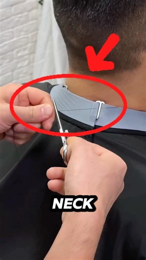 Why is The Barber Pulling out This String