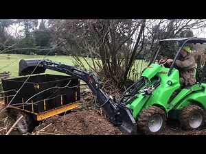 Avant 423 loader with 210 backhoe