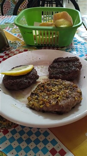 Grilled horse meat - Achille Italian restaurant; Catania, Sicily