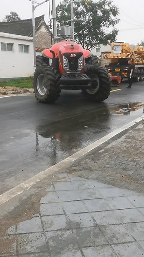 Asian Technology on Instagram: "Watch as a remote-controlled tractor effortlessly backs onto the road to attach a cultivator to its rear. This amazing technology showcases precision and power, with the tractor's powerful engine making the task seamless. It's a perfect blend of innovation and strength, revolutionizing farming with efficiency and control. A glimpse into the future of agriculture!"