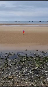 Somewhere on this vast beach is a little dot of colour. Imagine what the D Day landing beaches looked like when they were thick with men and equipment in June 1944. Arromanches, on Sword Beach, shows the immensity of the operation and it takes the breath away. #ddaylandings | Timmy Mallett