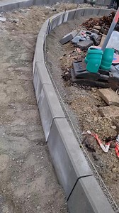 Making a curving path with 50cm concrete stones. #construction #realestate #xmas #fblifestyle #design #curves | Obelechukwu Olisa