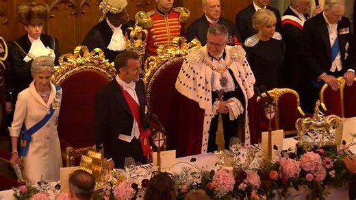 President Macron arrives at banquet at London's Guildhall