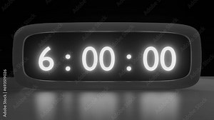Digital alarm clock with black and white clockface waking up at 6 AM. The numbers on the clock screen changes from 5:55 to 6:00 AM. Close up view. Digital Red Alarm Clock Timekeeper