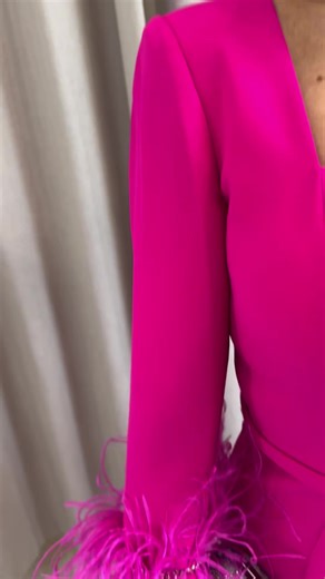 Bold. Vibrant. Effortlessly Chic. 💖 This stunning hot pink dress is made for the mum who isn’t afraid to stand out. With its sleek silhouette, contemporary feather detailing, and striking colour, it’s the perfect blend of modern glamour and confident style. A look that feels fresh, fashion-forward, and undeniably elegant — because modern mums deserve something truly special ✨ #MotherOfTheBride #motherofthegroom #2026wedding #modernmotherofthebride #bright