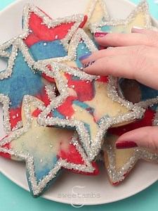 87K views · 463 reactions | Celebrate the 4th of July with these fun, easy, and delicious cookies. This is a great project for all ages! Get the supplies to make these cookies yourself: https://globalbelly.com/collections/sweetambs/products/sweetambs-4th-of-july-star-cookies-supplies #cookiedecorating #sweetambscookies #cookies #summercookies #royalicing #decoratedcookies #celebratewithcookies #4thofjulycookies #independencedaycookies #sweetambs #kidsinthekitchen | SweetAmbs | Facebook