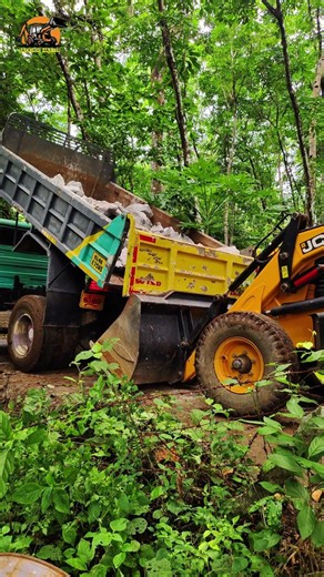 JCB 3DX Backhoe Loading Large Rocks into Front Bucket.|BackhoeMaster|