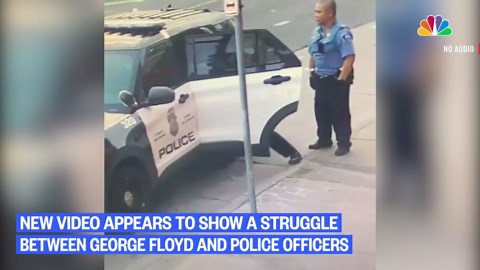 New video shows Minneapolis officers appear to struggle with George Floyd in back of patrol car