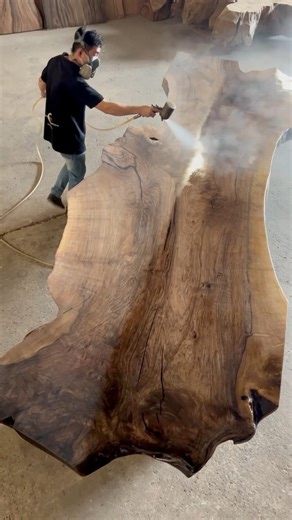 A rare piece of history. This walnut tree lived for centuries before it passed naturally from old age. We were able to salvage only two slabs from this giant, this is the first. One of two… and the second is even more outrageous. Who’s ready to see it? #WalnutWood #LuxuryFurniture #ArchitecturalDesign #SustainableLuxury #LiveEdgeTable #BespokeInteriors #CraftedByHand #InteriorDesignInspiration | Reduxwood
