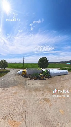 Ag bagging our oat silage #agbag #silage #dairyfarm #johndeere #freightliner