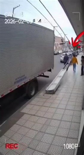 Truck strikes concrete pole on sidewalk