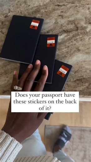 Have you noticed these stickers on the back of your passport? Here’s what it really means! It