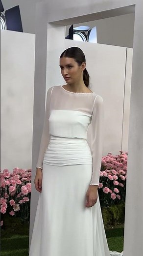 Minimal and modern wedding dress with sheer long sleeve