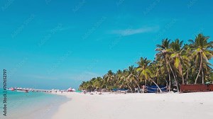 Summer vacation beach background. White sand beach with coconut trees. Heavenly Island with turquoise water. Summer tourism concept.