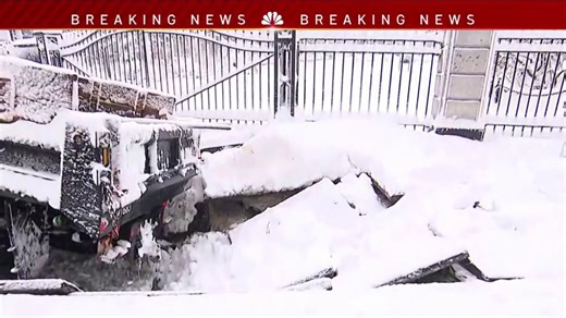 Snow plow stuck in sinkhole near NYC City Hall