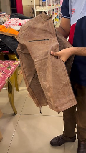 109K views · 1.2K reactions | Rugged Distressed Tan Racer Jacket A distressed tan/brown racer jacket with a smooth interior lining and zippered pockets, offering a perfect blend of rugged and contemporary style. Price 2750 with delivery Order now www.apnabazar.com.pk OR https://wa.link/apnabazar WhatsApp on 03009794222/0321-4246-436. | APNA BAZAR | Facebook