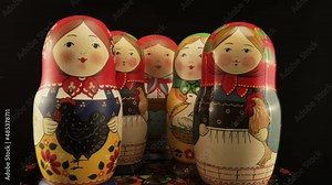 National Russian nesting dolls. Five figures depicting girls holding domestic birds in their hands.