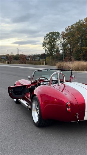 Jonathan Motorcars on Instagram: "FINAL RIDE‼️1965 @backdraft_racing Cobra 🐍 Finished in Red Diamond with the first ever @roushperformance 427 MPI fuel Injection set up! Can’t wait for the next one! #JMCCobra #shelby #sold JMC is your Official Backdraft Racing Dealer! ☎️609-871-2700 💻JMCCobra.com"
