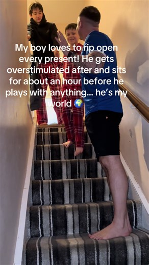 Joyful Christmas Present Opening with My Son