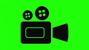 Download Simple Rolling, Rotating Film Camera on Green Background for free