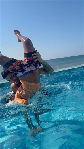 Dad and son play fight in the pool then this happens #shorts