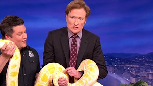 Conan cozies up to a python. #CONAN | Team Coco