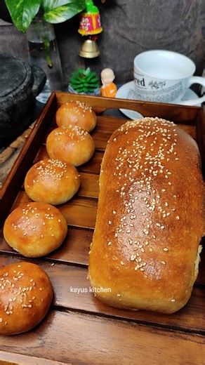 Kayus Kitchen on Instagram: "Soft, sweet n totally crave-able! 😋 - - - - - SWEET MINI BUNS N BREAD 🍞 Who's grabbing a bun Fresh outta the oven! 🍞🧡 Ingredients Maida 2 cups Instant yeast 2 tsps Salt 1/2 tsp Warm milk 250 ml Condensed milk 3 tbsps 1 egg 1 tbsp soft butter Sesame seeds as needed Butter to brush in the top of hot buns Milk to brush in the top of the hot buns #kayuskitchen #SweetBuns #sweetbread #FreshBaked #BreadLovers HomeBaking food recipesintamil instaviralreels healthyfood i