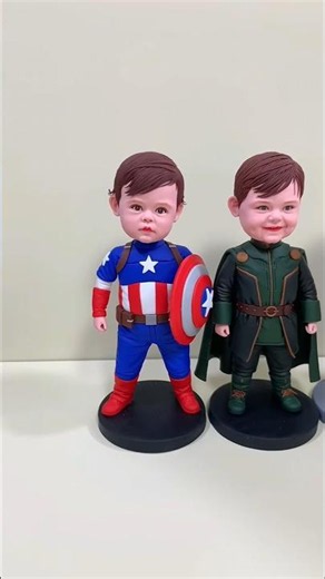 Unstoppable Joy with Handmade Clay Bobbleheads Swaying Together