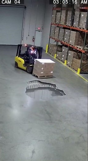 🤯 SINKHOLE SWALLOWS FORKLIFT! Warehouse Disaster Caught on Security Cam
