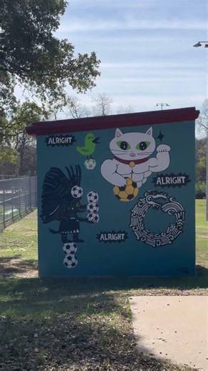 Walking Past the Mural Near the Soccer Fields — Dittmar Park