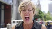 4k video footage of an attractive mature woman screaming at the...