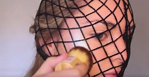She Puts Fishnet Stockings On Her Face Then Adds Eye Shadow. The Finished Look? AMAZING!