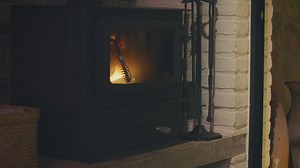 Fireplace heater lit inside a house - Free Stock Video