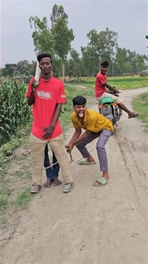 Trying to tie up two of a man's four legs and carry them away